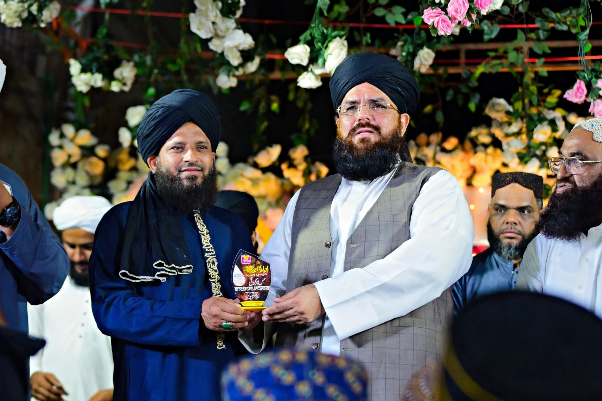 Syed Muhammad Ali Shah receiving a shield of honour at the Hyderabad ceremony